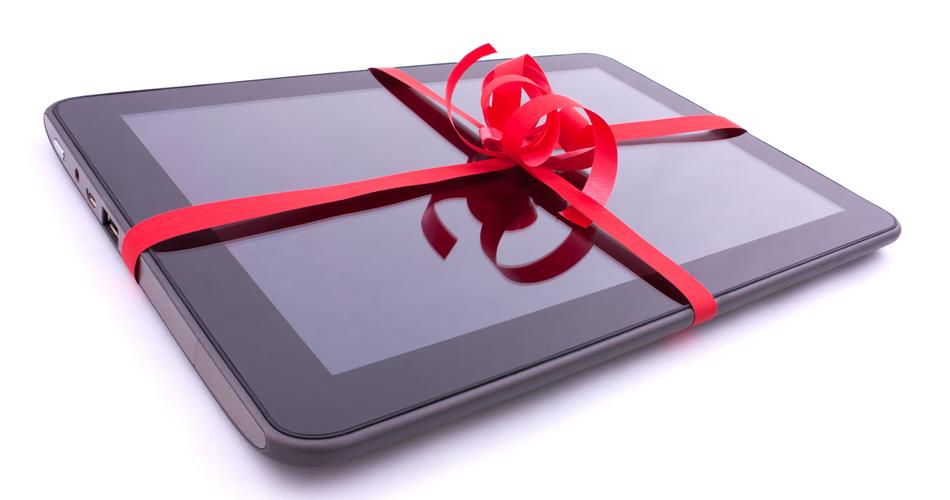 tablette numérique et ruban rouge